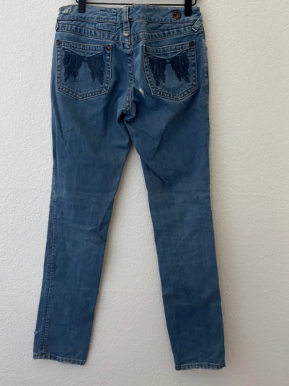 Vintage Free People angel wing embroidered pockets straight leg jeans size 27